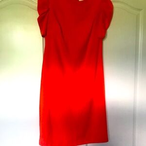 Dress with pleated sleeves